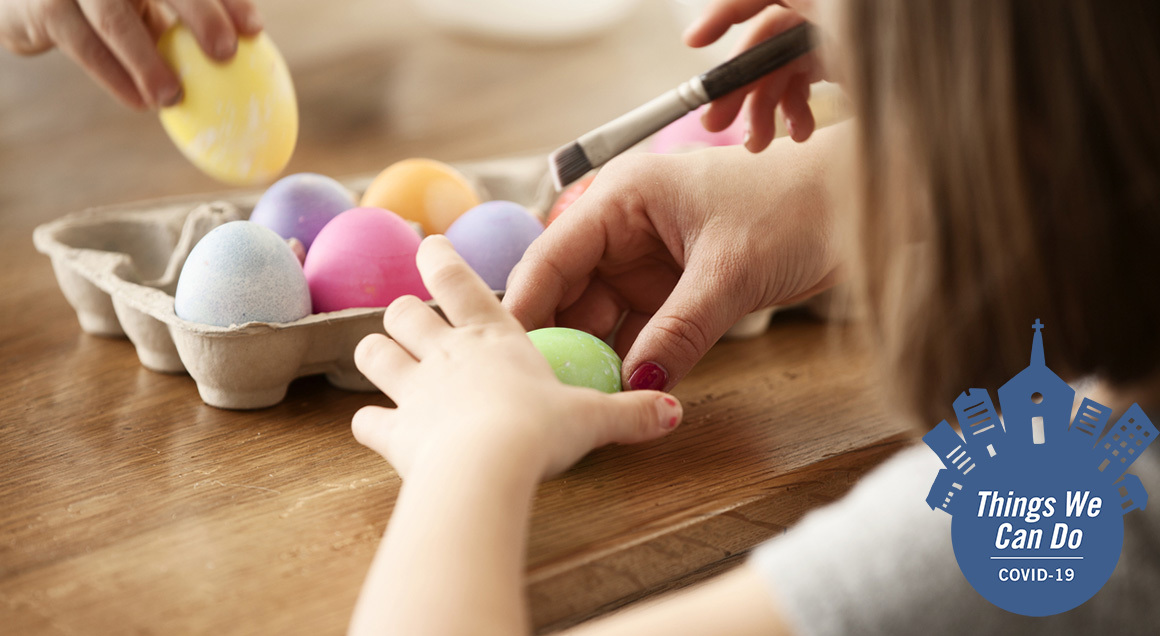 Painting easter eggs with covid badge