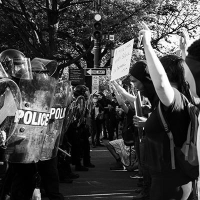 Police and protestors 400x400