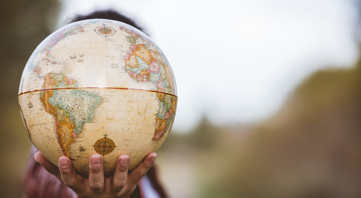 Stock Hand holding globe 72px