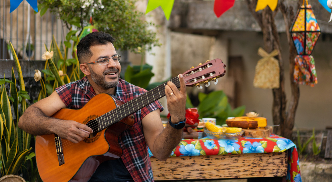 Stock man playing guitar
