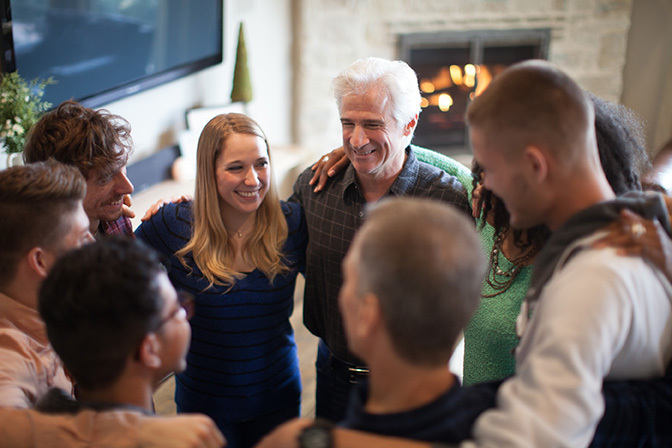 Stock people of various ages standing in circle