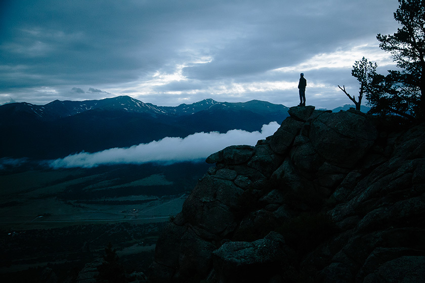 Stock person overlooking mountain