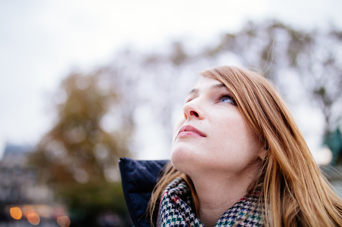 Stock woman looking upward
