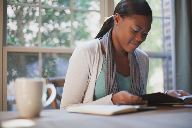 Stock woman reading book