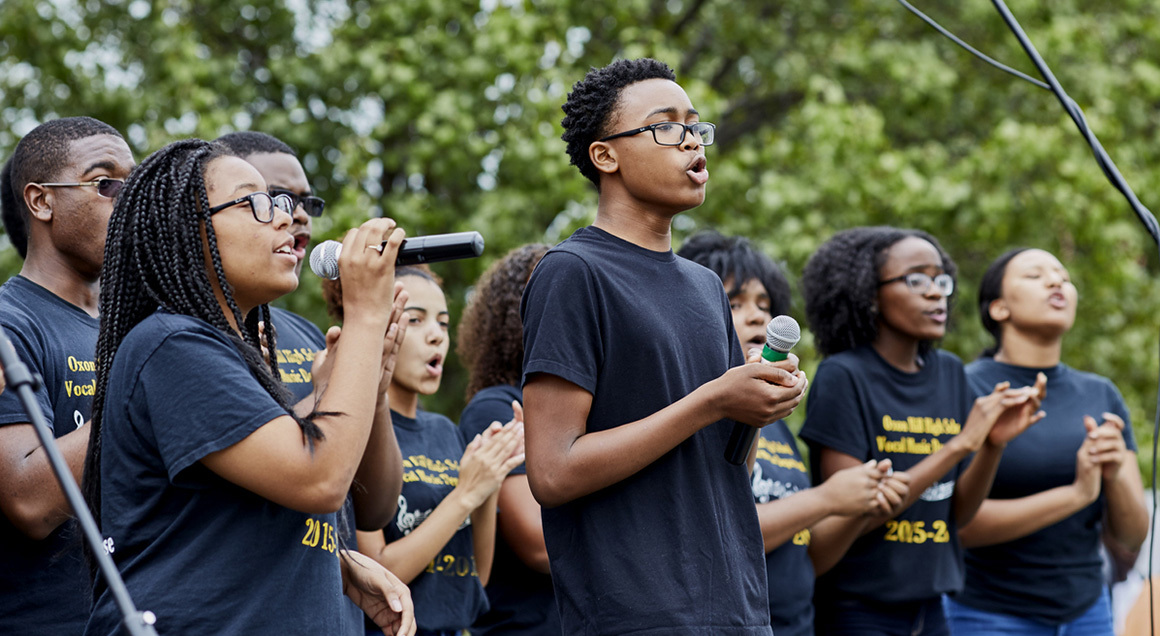 Youth choir singing outside 72px