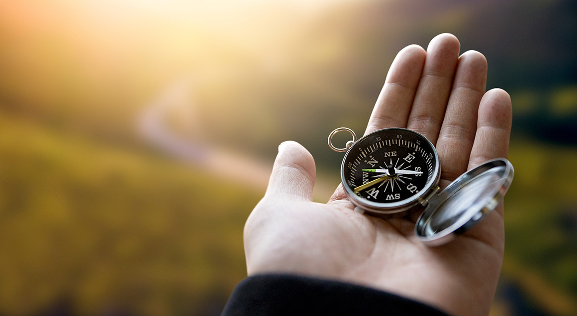 I S Compass In Hand