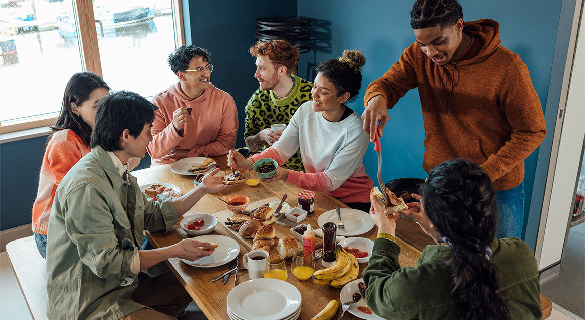 I S Diverse Group Eating Breakfast