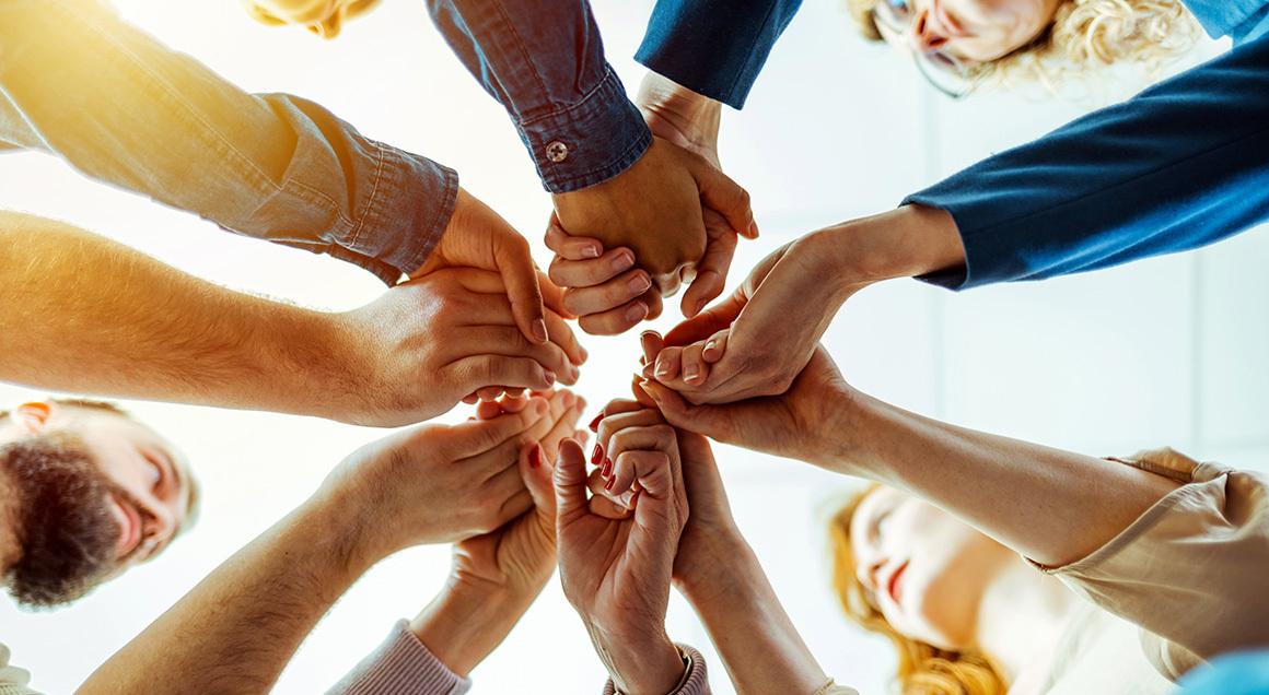 I S Group Circle Holding Hands