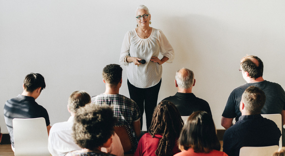 I S Older Woman Teaching Class